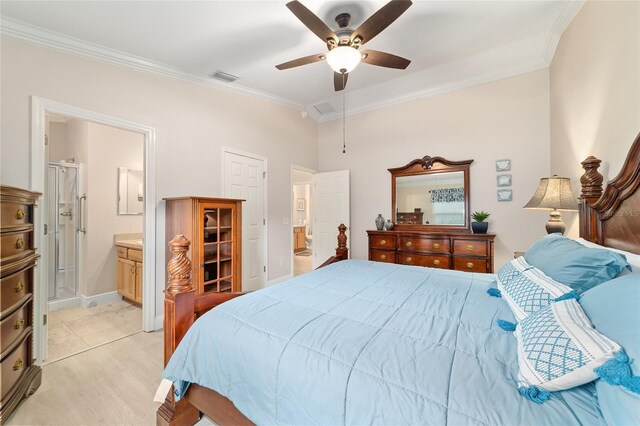 2237 Jetta Way, The Villages, FL 32162 - bedroom featuring ornamental molding, connected bathroom, and ceiling fan