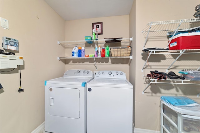 2237 Jetta Way, The Villages, FL 32162 - laundry area with washer and clothes dryer and baseboards