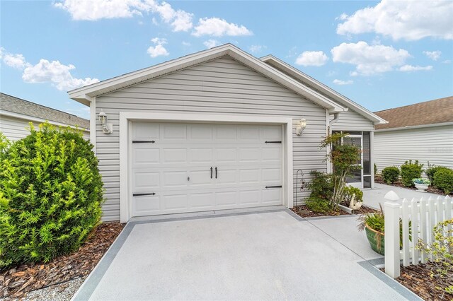 2237 Jetta Way, The Villages, FL 32162 - view of front facade featuring driveway and a garage