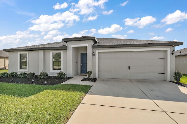1940 Piedmont Ct, Mascotte, FL 34753 - prairie-style house featuring concrete driveway, stucco siding, a garage, a front yard, and a shingled roof