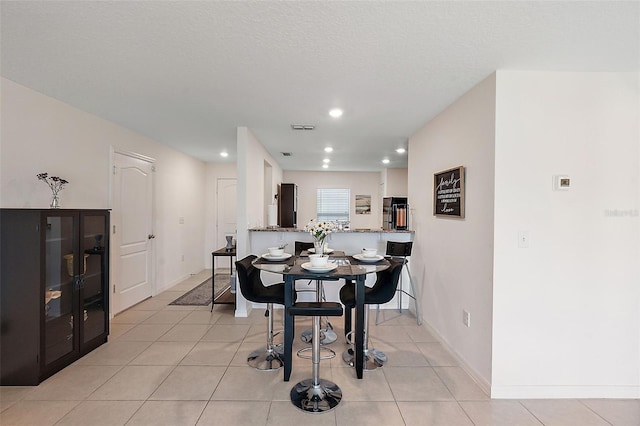 1940 Piedmont Ct, Mascotte, FL 34753 - dining space featuring recessed lighting and light tile patterned flooring