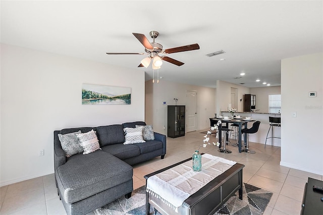 1940 Piedmont Ct, Mascotte, FL 34753 - living room featuring a ceiling fan, light tile patterned flooring, and recessed lighting