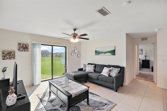 1940 Piedmont Ct, Mascotte, FL 34753 - living room with a ceiling fan and light tile patterned flooring