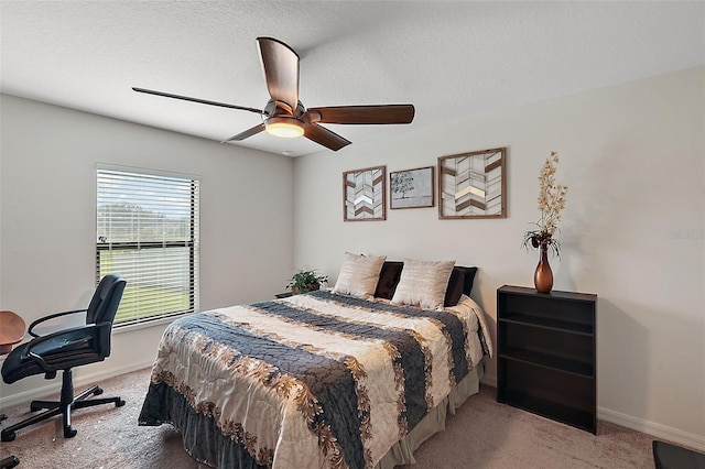 1940 Piedmont Ct, Mascotte, FL 34753 - carpeted bedroom with baseboards and a ceiling fan