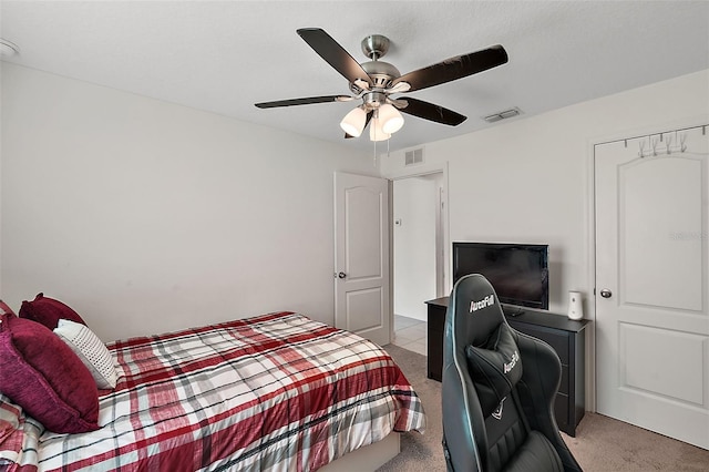 1940 Piedmont Ct, Mascotte, FL 34753 - carpeted bedroom featuring a ceiling fan and a desk