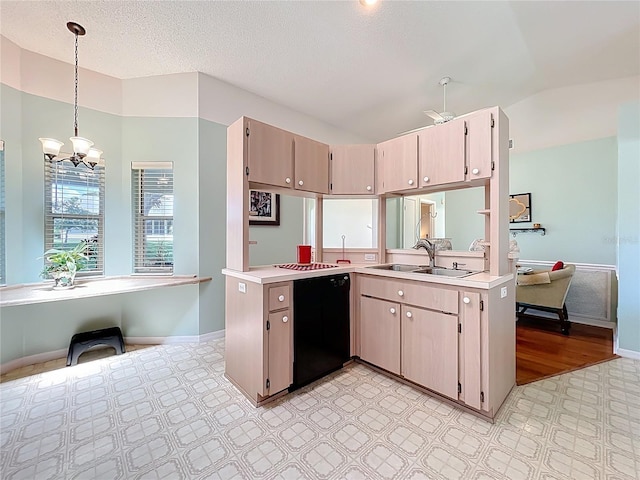 27141 Racquet Cir, Leesburg, FL 34748 - kitchen featuring black dishwasher, light countertops, a chandelier, hanging light fixtures, and vaulted ceiling
