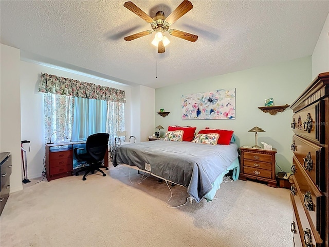 27141 Racquet Cir, Leesburg, FL 34748 - bedroom with light carpet, a textured ceiling, an office area, and ceiling fan