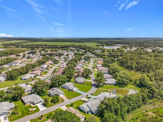 27141 Racquet Cir, Leesburg, FL 34748 - aerial view of residential area featuring a nearby body of water
