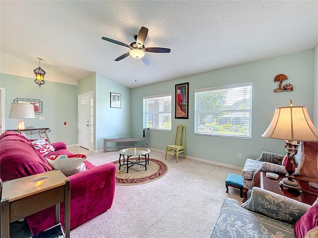 27141 Racquet Cir, Leesburg, FL 34748 - living area with ceiling fan, carpet floors, a textured ceiling, and lofted ceiling