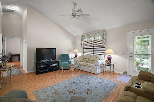 1007 Diego Ct, The Villages, FL 32159 - living area with ceiling fan, light wood-type flooring, and high vaulted ceiling