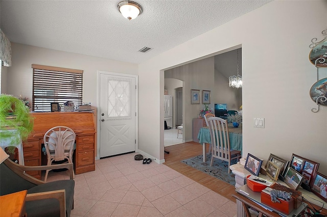 1007 Diego Ct, The Villages, FL 32159 - home office with arched walkways, light tile patterned flooring, and a textured ceiling