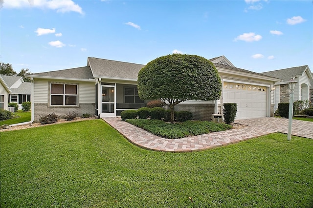1007 Diego Ct, The Villages, FL 32159 - single story home featuring driveway, a front lawn, an attached garage, brick siding, and roof with shingles