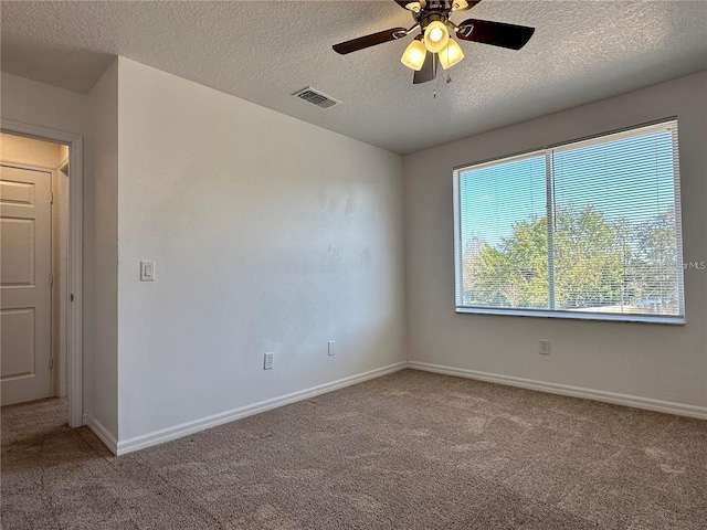 624 Australian Way, Davenport, FL 33897 - unfurnished room featuring carpet, a textured ceiling, and a ceiling fan