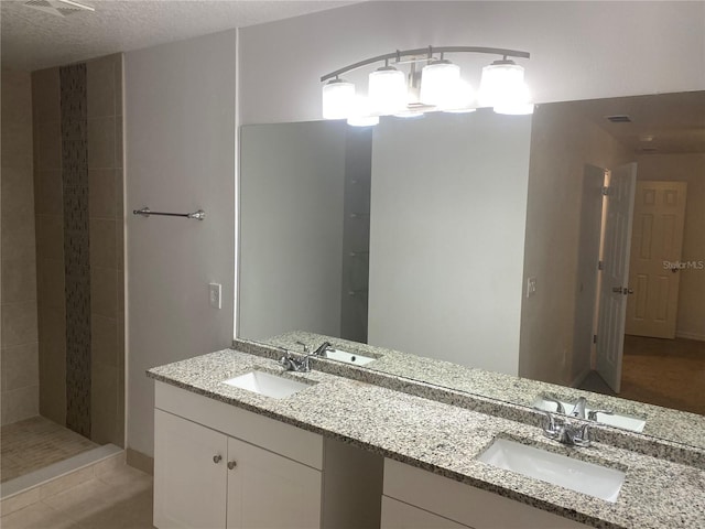 624 Australian Way, Davenport, FL 33897 - bathroom with double vanity and tiled shower