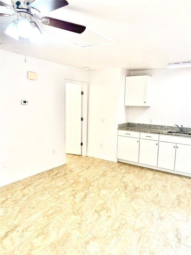 624 Australian Way, Davenport, FL 33897 - unfurnished room featuring a sink and ceiling fan