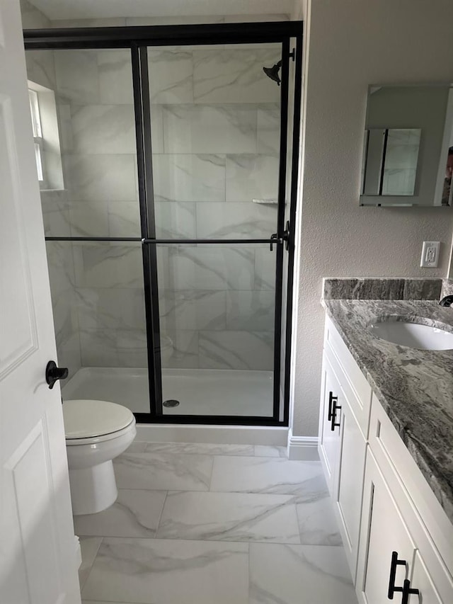 6769 N Waterman Dr, Dunnellon, FL 34433 - bathroom with vanity, marble finish flooring, a stall shower, and a textured wall