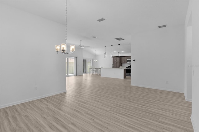6949 Minchew Cir, The Villages, FL 34762 - unfurnished living room with a chandelier, light wood finished floors, recessed lighting, and ceiling fan