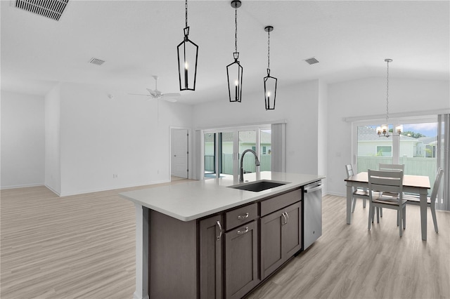 6949 Minchew Cir, The Villages, FL 34762 - kitchen with dishwasher, healthy amount of natural light, light countertops, a ceiling fan, and lofted ceiling