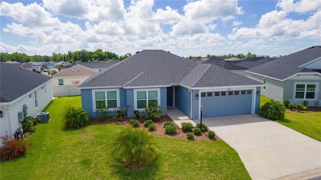 6949 Minchew Cir, The Villages, FL 34762 - ranch-style house with an attached garage, a residential view, concrete driveway, roof with shingles, and stucco siding