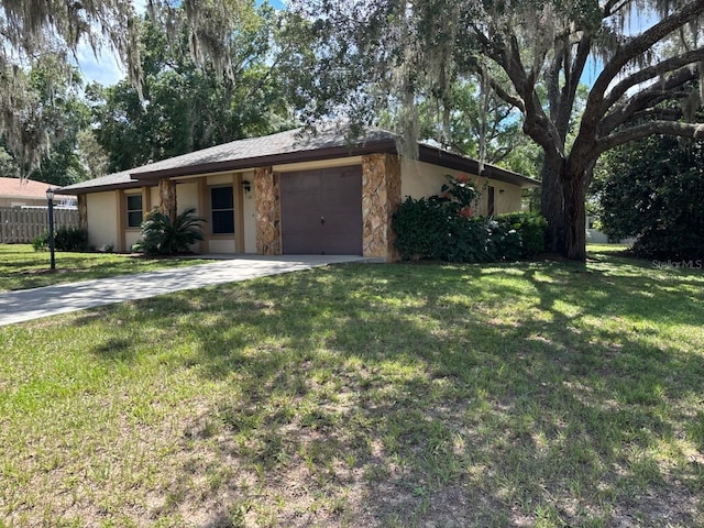 7186 N Whippoorwill Ter, Hernando, FL 34442 - ranch-style home with a garage, stone siding, driveway, and stucco siding