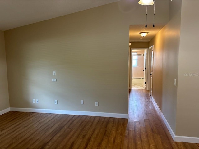 7186 N Whippoorwill Ter, Hernando, FL 34442 - hall with dark wood-style flooring and baseboards