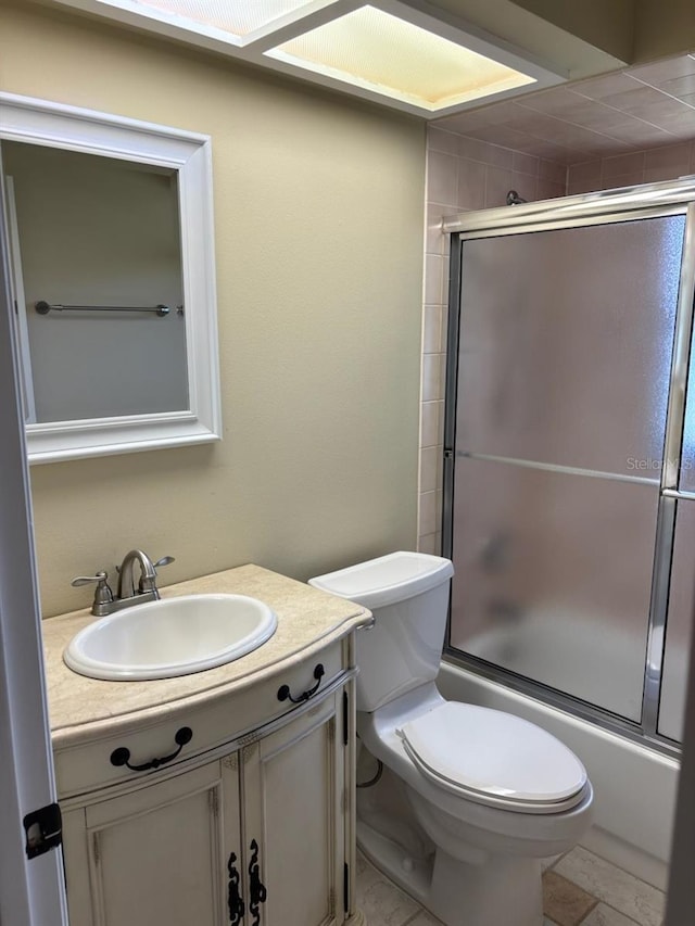 7186 N Whippoorwill Ter, Hernando, FL 34442 - full bathroom with vanity and shower / bath combination with glass door
