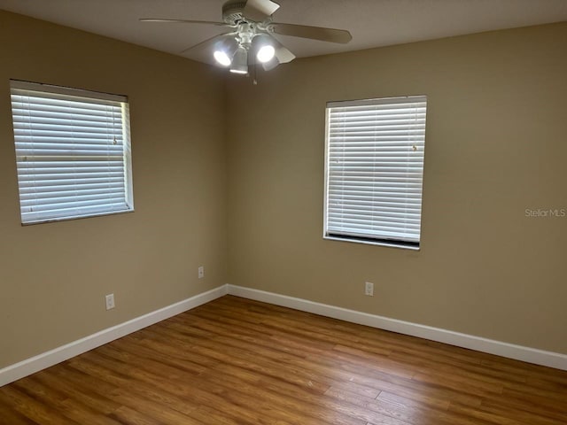 7186 N Whippoorwill Ter, Hernando, FL 34442 - unfurnished room with wood finished floors and a ceiling fan