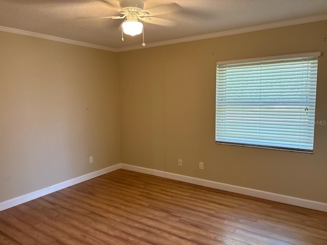 7186 N Whippoorwill Ter, Hernando, FL 34442 - spare room with wood finished floors, crown molding, and a ceiling fan