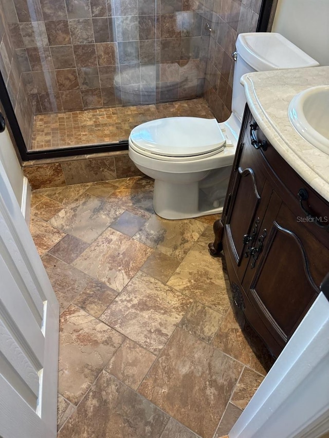 7186 N Whippoorwill Ter, Hernando, FL 34442 - full bath with stone tile floors, a stall shower, and vanity