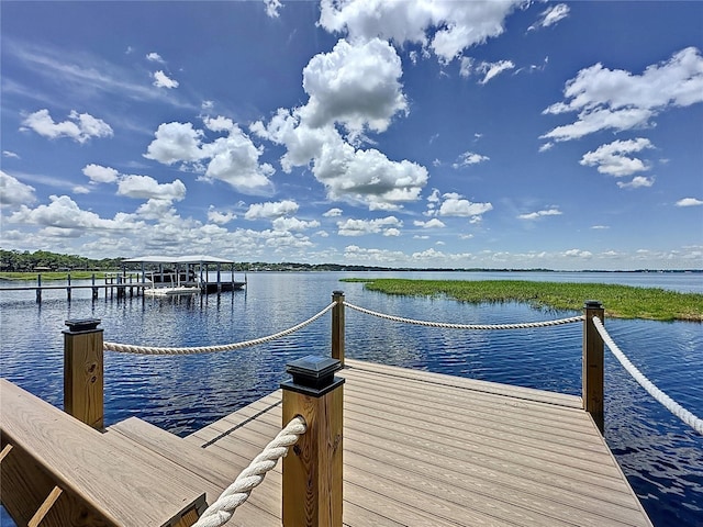 11401 Cypress Dr, Clermont, FL 34711 - dock featuring a water view