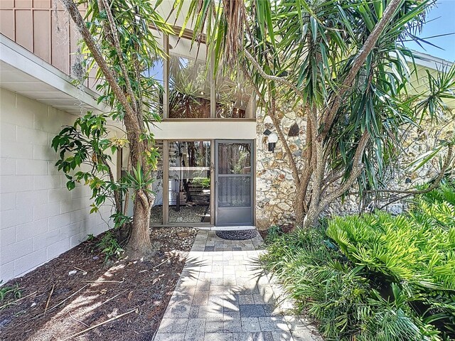11401 Cypress Dr, Clermont, FL 34711 - doorway to property with concrete block siding