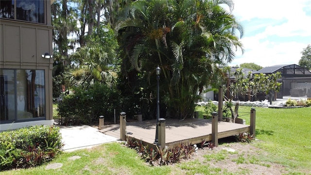 11401 Cypress Dr, Clermont, FL 34711 - view of green lawn featuring a deck