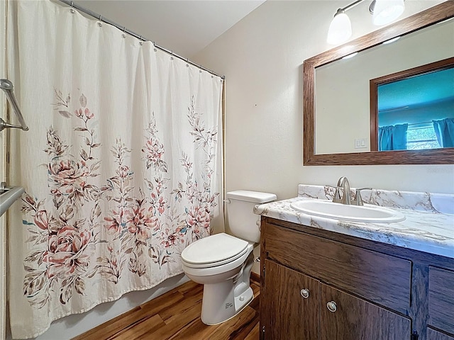 11401 Cypress Dr, Clermont, FL 34711 - full bath featuring vanity and wood finished floors