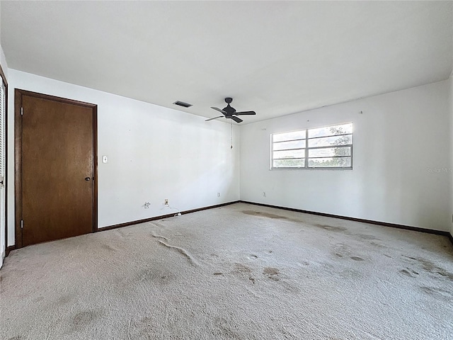 11401 Cypress Dr, Clermont, FL 34711 - unfurnished room featuring a ceiling fan and carpet flooring