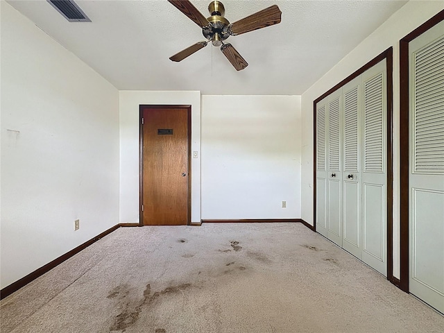 11401 Cypress Dr, Clermont, FL 34711 - unfurnished bedroom with carpet and ceiling fan