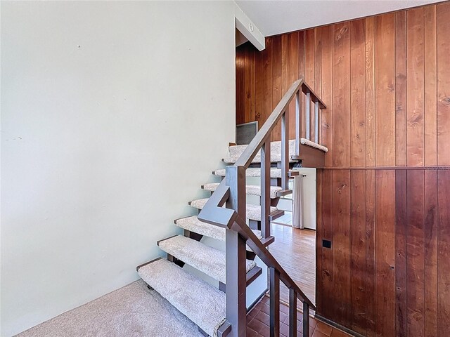 11401 Cypress Dr, Clermont, FL 34711 - staircase featuring wood walls and beamed ceiling