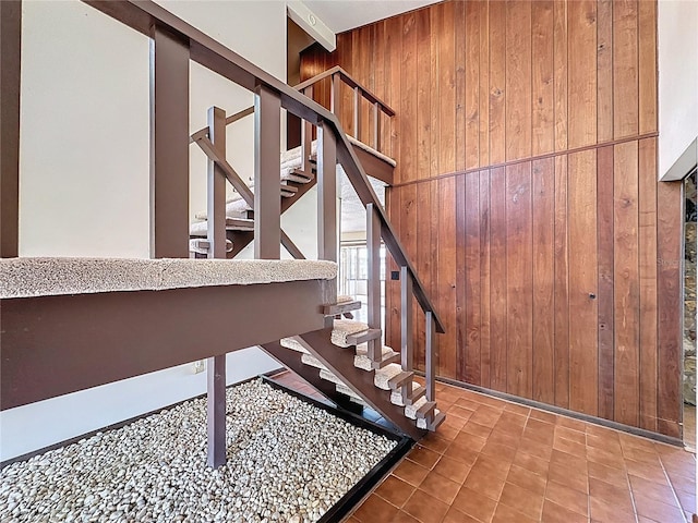 11401 Cypress Dr, Clermont, FL 34711 - stairway featuring wooden walls and tile patterned flooring