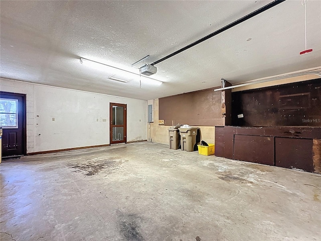 11401 Cypress Dr, Clermont, FL 34711 - garage with electric panel and a garage door opener