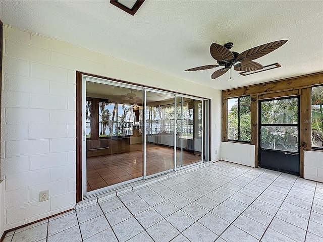 11401 Cypress Dr, Clermont, FL 34711 - unfurnished sunroom featuring ceiling fan