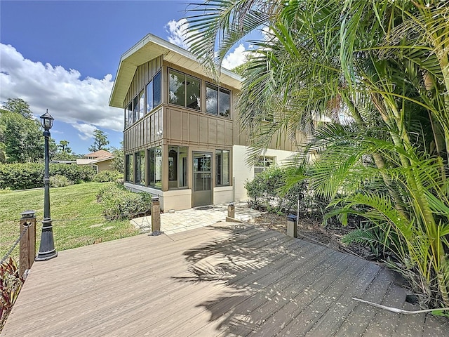11401 Cypress Dr, Clermont, FL 34711 - wooden deck with a yard