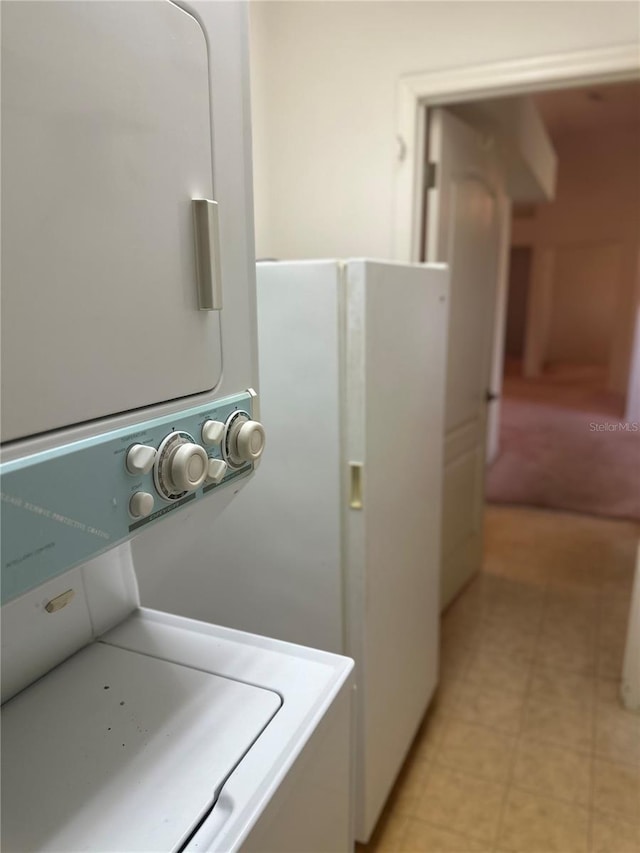 5268 SW 110th Pl, Ocala, FL 34476 - washroom with stacked washer / dryer