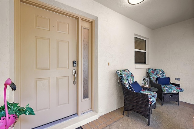 1002 Amarillo Pl, The Villages, FL 32159 - doorway to property featuring stucco siding