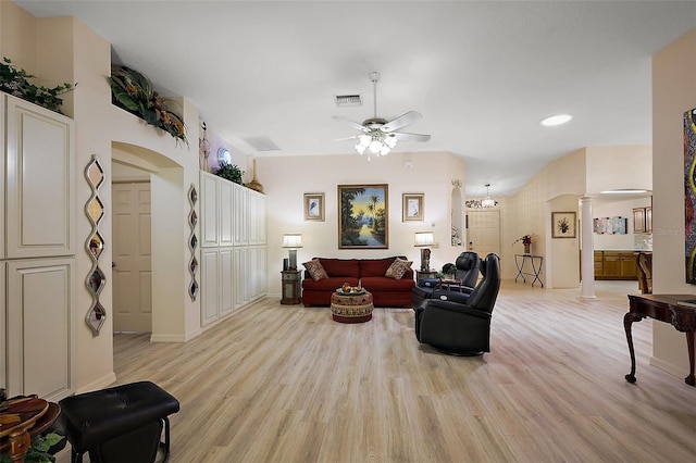 1002 Amarillo Pl, The Villages, FL 32159 - living area featuring arched walkways, decorative columns, light wood-style floors, ceiling fan, and recessed lighting