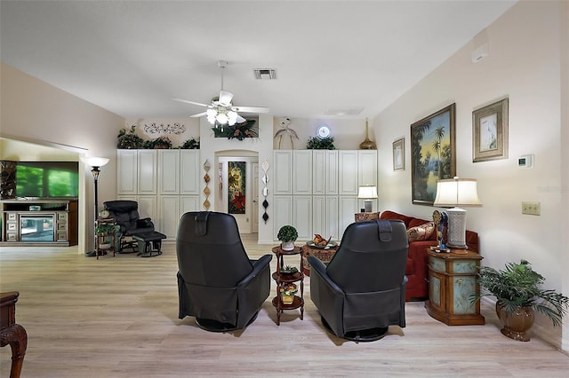 1002 Amarillo Pl, The Villages, FL 32159 - living area featuring light wood finished floors and ceiling fan