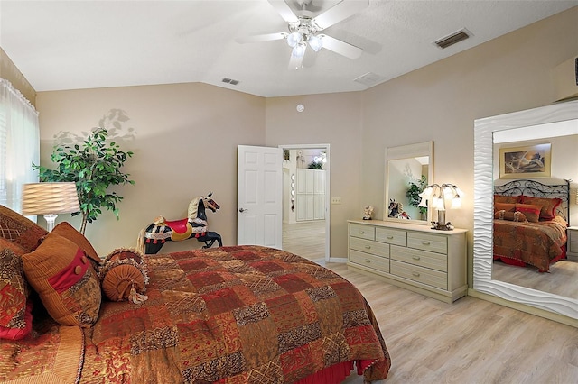 1002 Amarillo Pl, The Villages, FL 32159 - bedroom with lofted ceiling, light wood finished floors, and a ceiling fan