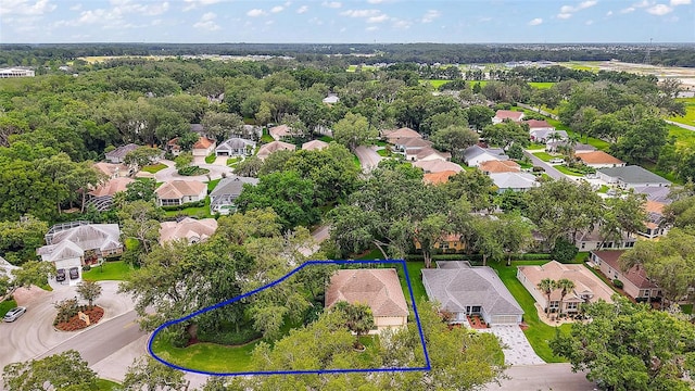 1002 Amarillo Pl, The Villages, FL 32159 - aerial perspective of suburban area with property boundaries highlighted