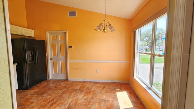 12512 Draw Dr, Grand Island, FL 32735 - unfurnished dining area featuring lofted ceiling and a chandelier