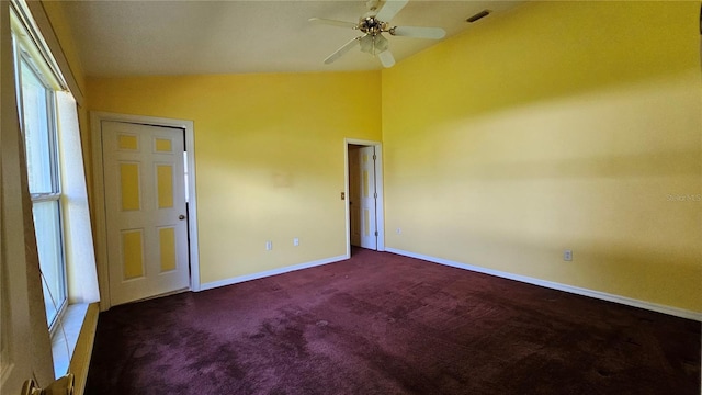 12512 Draw Dr, Grand Island, FL 32735 - carpeted spare room featuring vaulted ceiling and ceiling fan