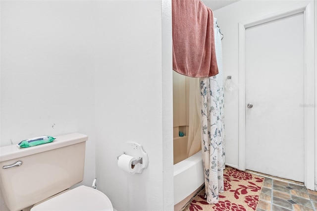3401 Sunrise Villas Ct S, Tampa, FL 33614 - bathroom with toilet and shower / bathtub combination with curtain