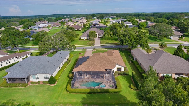 aerial view of property and surrounding area with nearby suburban area